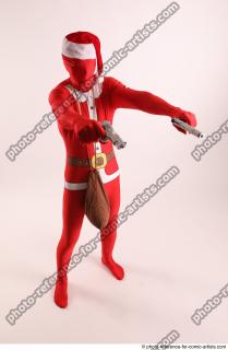 17 2019 01 JOEL ADAMSON CHRISTMAS VILLAIN WITH TWO GUNS